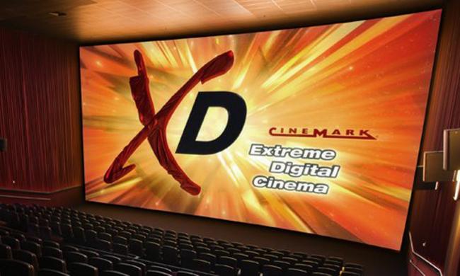 Watch a 3D movie in comfortable stadium seating.