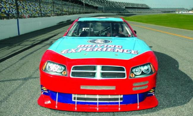 You can drive or ride along in a NASCAR race car that travels up to 120 mph.