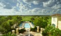The formal pool of The Omni Orlando Resort at ChampionsGate overlooking the course.