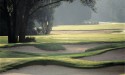 Players can navigate the bunkers surrounding the rolling, lucious greens.