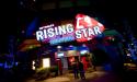 Sing karaoke with a live band at CityWalk's Rising Star.