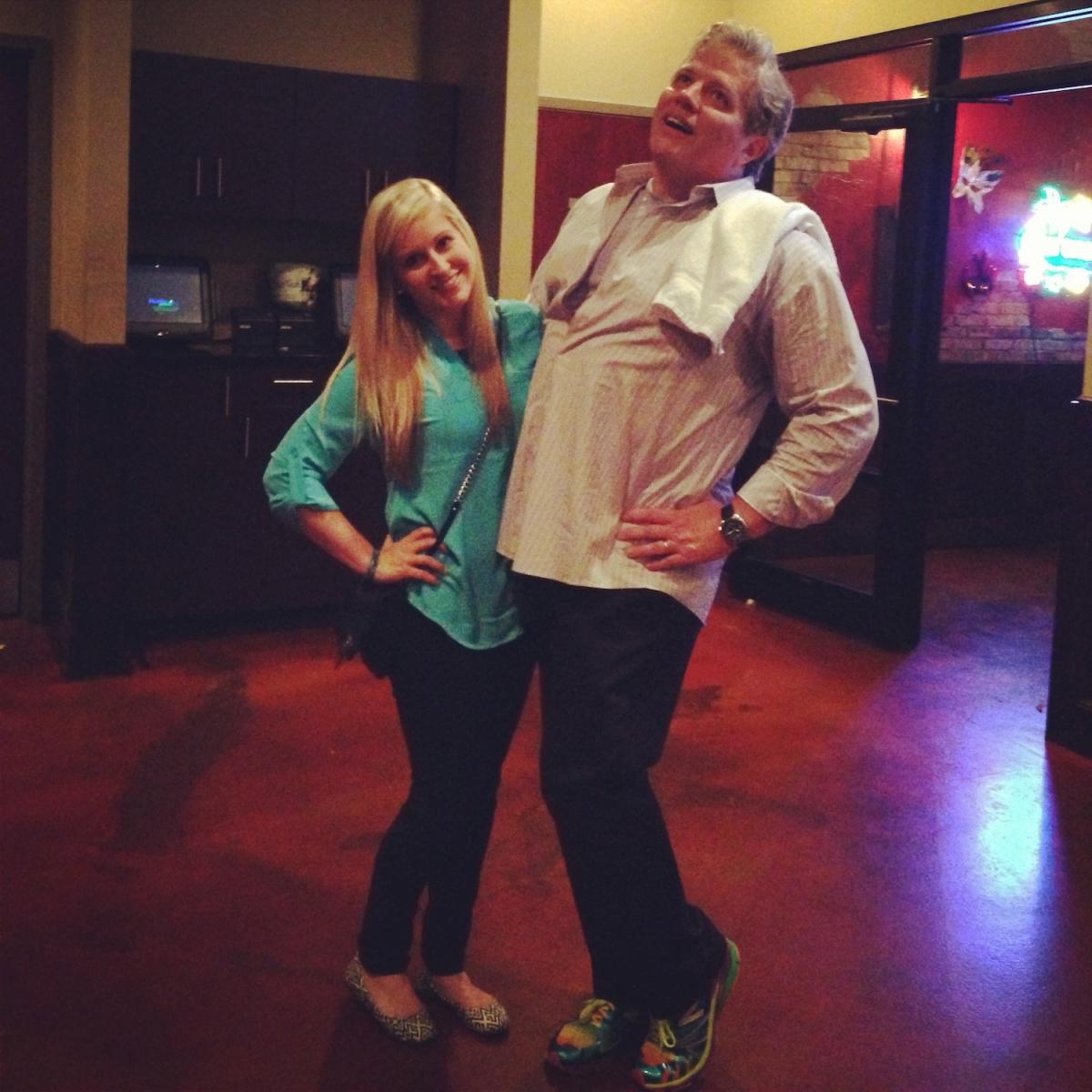 Comedian Tom Wilson poses for photos after his stand-up performance at The Orlando Improv.